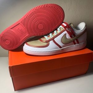 Red and white Nike Vandal Low